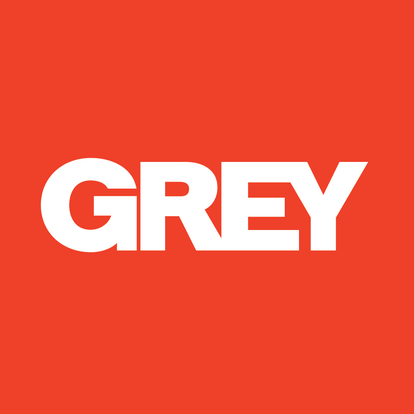 Grey logo valkoisena punaisessa laatikossa